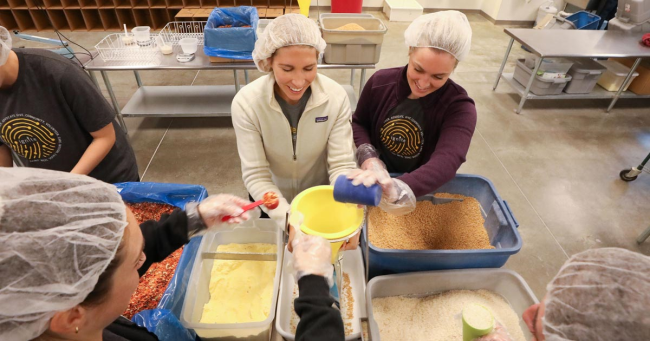employees volunteering at food bank